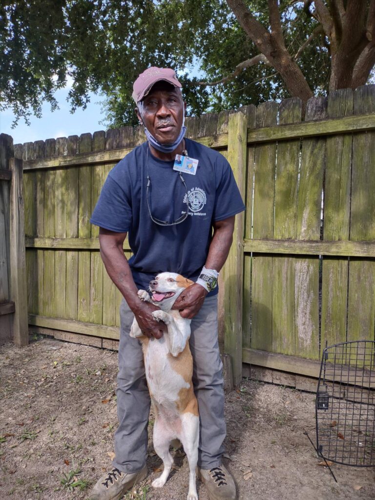 Photograph of Parole Project client Alex and his dog Pearlie.