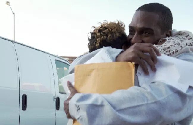 Parole Project client hugging person after release from prison
