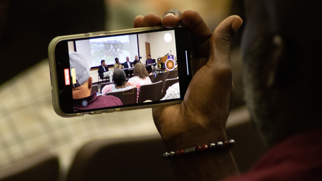 Phone screen recording panel talking during the Visiting Room Project event