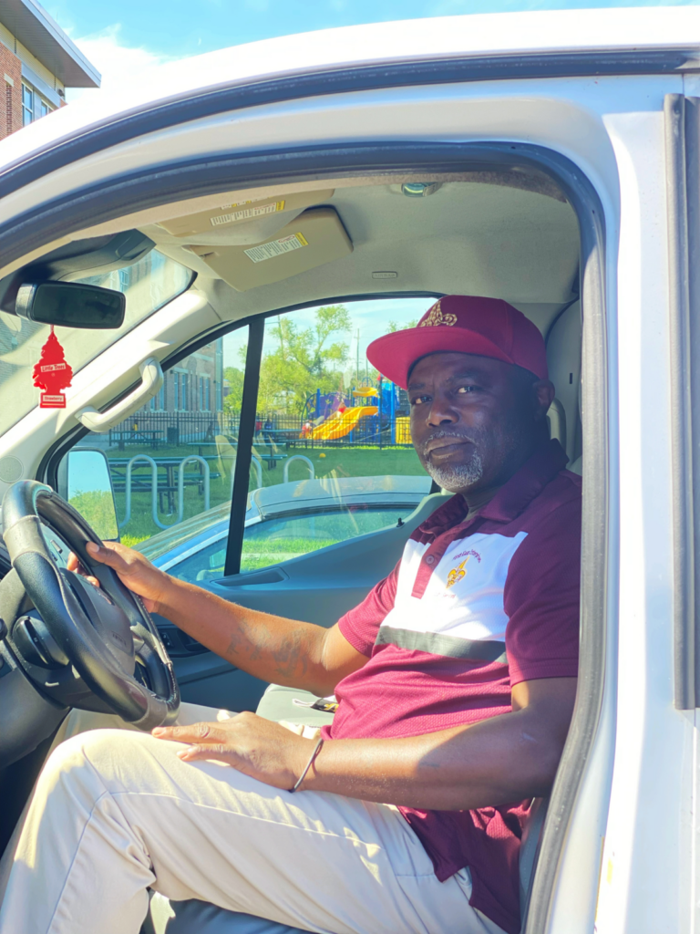 Paul Stone sitting in the driver seat of his truck