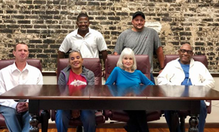 Photo of Parole Project clients Travis, Robert, Paul, Rachael, Beatrice, and Benson